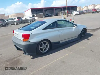 2000 Toyota Celica GT z VIN JTDDR32T4Y0065557, wystawiony jako IAAI lot #41916489 z przebiegiem 180 923 mil mil oraz . Historia ofert i sprzedaży dostępna na DreamBid. Obrazek 4.