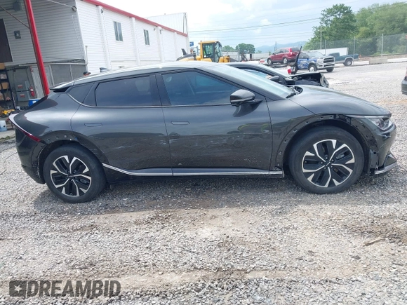 2022 Kia EV6 Wind z VIN KNDC3DLC5N5034625, wystawiony jako IAAI lot #42263100 z przebiegiem 35 412 mil mil oraz . Historia ofert i sprzedaży dostępna na DreamBid. Obrazek 13.