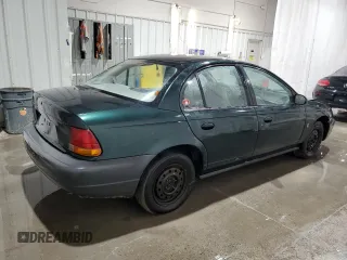 1998 Saturn SL z VIN 1G8ZH5280WZ312544, wystawiony jako Copart lot #50971665 z przebiegiem 119 855 mil mil oraz Szkoda całkowita • Salvage title. Historia ofert i sprzedaży dostępna na DreamBid. Obrazek 3.