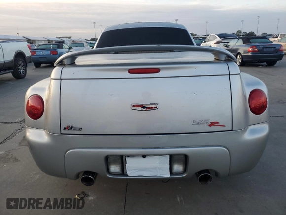 2004 Chevrolet SSR LS z VIN 1GCES14P14B105315, wystawiony jako Copart lot #74983944 z przebiegiem Nie podano mil oraz Szkoda całkowita • Salvage title. Historia ofert i sprzedaży dostępna na DreamBid. Obrazek 6.