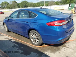 2017 Ford Fusion SE with VIN 3FA6P0HDXHR410660, listed as a Copart auction lot 64426135 with 79,936 mi miles and Salvage title. Bid and sale history available at DreamBid. Image 2.