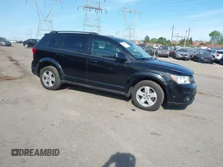 2012 Dodge Journey SXT z VIN 3C4PDDBGXCT160348, wystawiony jako IAAI lot #42096075 z przebiegiem 135 095 mil mil oraz . Historia ofert i sprzedaży dostępna na DreamBid. Obrazek 1.