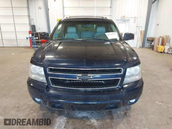 2009 Chevrolet Suburban LT w/1LT with VIN 1GNFK26319R272557, listed as a IAAI auction lot 42138238 with 223,599 mi miles. Bid and sale history available at carsss.com. Image 12.