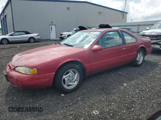 1997 Ford Thunderbird LX с VIN 1FALP62W4VH122159, выставлен на аукционе Copart как лот 65991795 с пробегом 115 091 миль миль и Чистый • Clean title. История ставок и продаж доступна на DreamBid. Изображение 1.