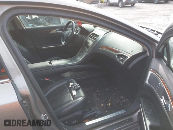 2015 Lincoln MKZ z VIN 3LN6L2JK4FR610596, wystawiony jako IAAI lot #41443285 z przebiegiem 114 363 mil mil oraz . Historia ofert i sprzedaży dostępna na DreamBid. Obrazek 5.