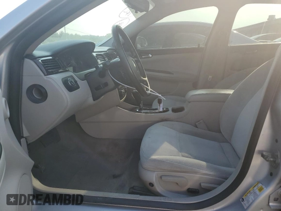 2014 Chevrolet Impala LT with VIN 2G1WB5E34E1161895, listed as a Copart auction lot 58414845 with 127,373 mi miles and Salvage title. Bid and sale history available at DreamBid. Image 7.