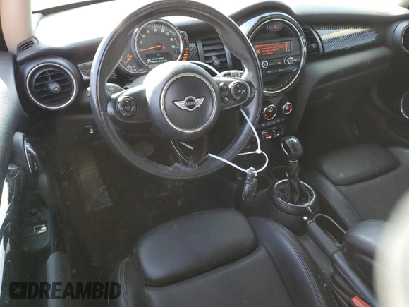 2014 MINI Hardtop S with VIN WMWXM7C57ET987816, listed as a Copart auction lot 41115434 with 122,724 mi miles and Salvage title. Bid and sale history available at DreamBid. Image 8.