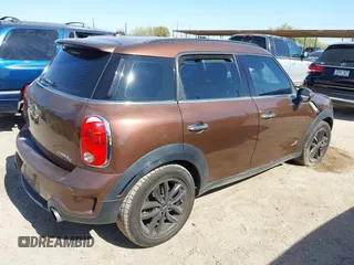 2013 MINI Countryman S ALL4 with VIN WMWZC5C58DWP30998, listed as a IAAI auction lot 42594984 with 153,792 mi miles and . Bid and sale history available at DreamBid. Image 4.