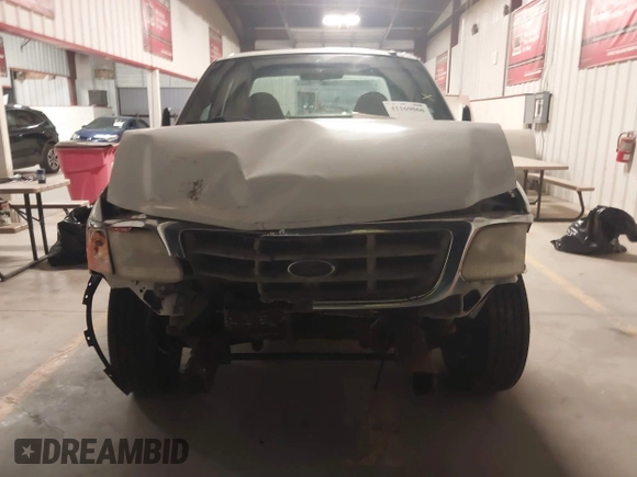 2001 Ford F-150 XL with VIN 1FTPX17L31NB27121, listed as a IAAI auction lot 41169060 with 247,389 mi miles and . Bid and sale history available at DreamBid. Image 12.