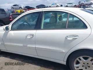 2003 Mercedes-Benz E-Class 3.2L with VIN WDBUF65J23A120318, listed as a IAAI auction lot 41927993 with 113,578 mi miles. Bid and sale history available at carsss.com. Image 14.