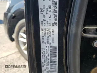 2013 Dodge Journey SXT with VIN 3C4PDDBG6DT639884, listed as a Copart auction lot 64623635 with 206,809 mi miles and Clean title. Bid and sale history available at DreamBid. Image 13.