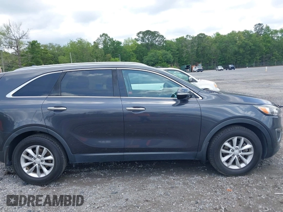 2017 Kia Sorento LX with VIN 5XYPG4A3XHG264438, listed as a IAAI auction lot 42135558 with 112,829 mi miles. Bid and sale history available at carsss.com. Image 13.