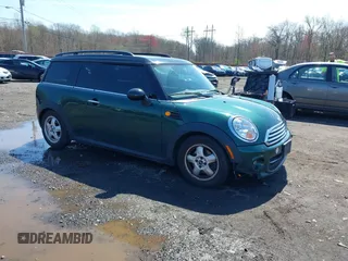 2011 MINI Clubman with VIN WMWZF3C57BT187802, listed as a IAAI auction lot 39206880 with 93,476 mi miles and . Bid and sale history available at DreamBid. Image 1.