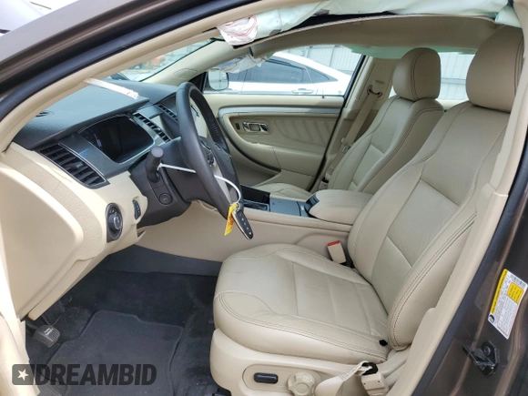 2015 Ford Taurus SEL with VIN 1FAHP2E89FG193926, listed as a Copart auction lot 61036375 with 23,963 mi miles and Salvage title. Bid and sale history available at DreamBid. Image 7.