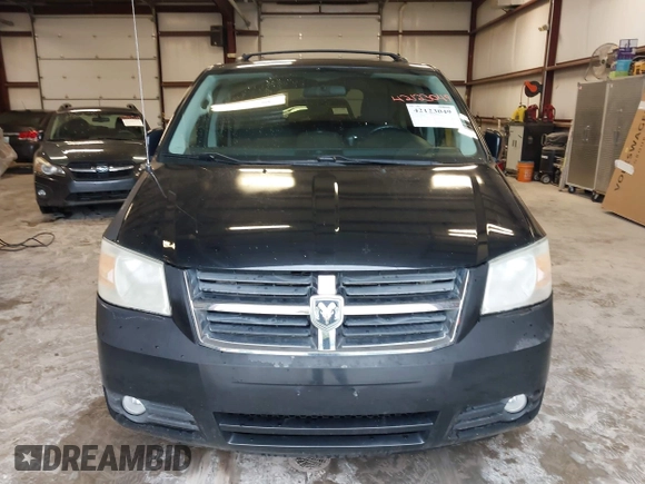 2010 Dodge Grand Caravan SXT with VIN 2D4RN5D19AR433481, listed as a IAAI auction lot 42123049 with 134,882 mi miles and . Bid and sale history available at DreamBid. Image 6.