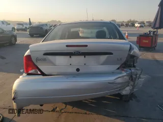 2000 Ford Focus LX with VIN 1FAFP33P6YW376765, listed as a Copart auction lot 75347554 with 189,468 mi miles and Salvage Title. Bid and sale history available at DreamBid. Image 6.