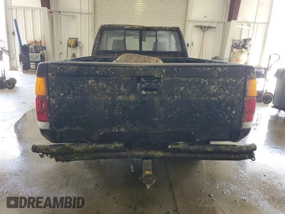 1986 Nissan Hardbody E z VIN 1N6ND16Y7GC413942, wystawiony jako Copart lot #57677605 z przebiegiem 126 183 mil mil oraz Tytuł czysty. Historia ofert i sprzedaży dostępna na DreamBid. Obrazek 6.