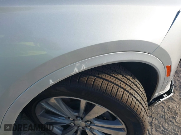 2020 Cadillac XT6 FWD Premium Luxury with VIN 1GYKPCRSXLZ136057, listed as a IAAI auction lot 42211514 with 32,476 mi miles and . Bid and sale history available at DreamBid. Image 17.