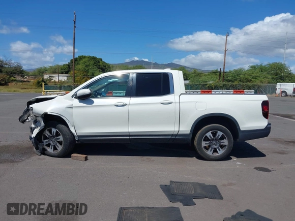 2019 Honda Ridgeline RTL with VIN 5FPYK2F52KB004624, listed as a IAAI auction lot 41789190 with 51,834 mi miles and . Bid and sale history available at DreamBid. Image 14.