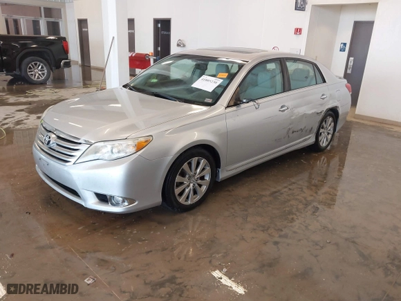 2012 Toyota Avalon with VIN 4T1BK3DB8CU468955, listed as a IAAI auction lot 41805238 with 180,836 mi miles. Bid and sale history available at carsss.com. Image 18.