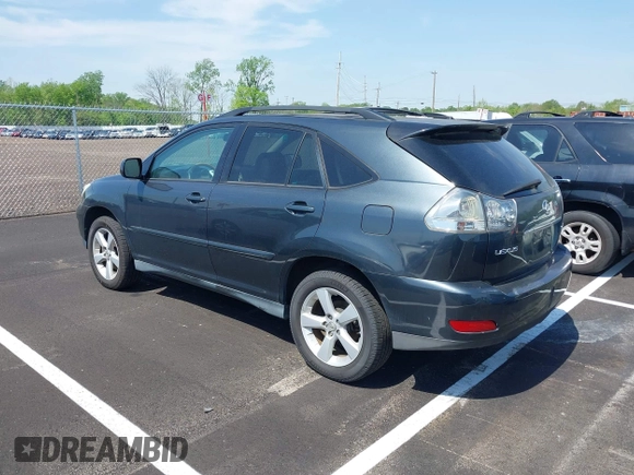 2007 Lexus RX with VIN 2T2GK31U07C021695, listed as a IAAI auction lot 42032252 with 146,023 mi miles. Bid and sale history available at carsss.com. Image 3.