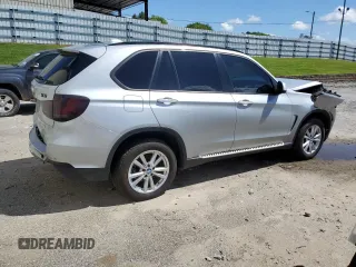 2015 BMW X5 xDrive35i z VIN 5UXKR0C52F0P12247, wystawiony jako Copart lot #54955465 z przebiegiem 87 315 mil mil oraz Szkoda całkowita • Salvage title. Historia ofert i sprzedaży dostępna na DreamBid. Obrazek 3.