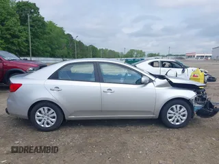 2010 Kia Forte EX z VIN KNAFU4A27A5834628, wystawiony jako IAAI lot #42123726 z przebiegiem 89 402 mil mil oraz . Historia ofert i sprzedaży dostępna na DreamBid. Obrazek 14.