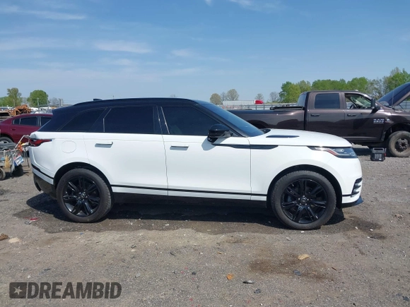 2020 Land Rover Range Rover Velar R-Dynamic S z VIN SALYK2EX4LA272072, wystawiony jako IAAI lot #41910957 z przebiegiem 63 823 mil mil oraz . Historia ofert i sprzedaży dostępna na DreamBid. Obrazek 13.