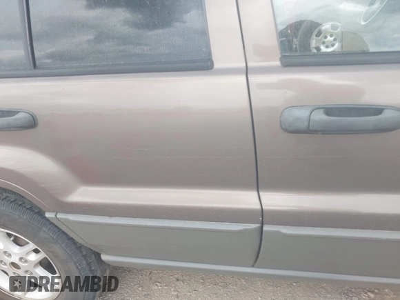 2002 Jeep Grand Cherokee Laredo with VIN 1J4GX48S32C168105, listed as a IAAI auction lot 42451373 with 293,790 mi miles and . Bid and sale history available at DreamBid. Image 6.