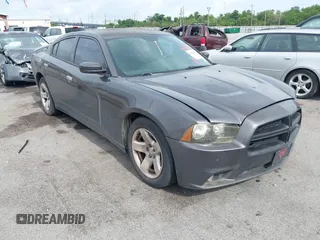 2014 Dodge Charger Police z VIN 2C3CDXAT9EH191184, wystawiony jako IAAI lot #42468882 z przebiegiem 202 790 mil mil oraz . Historia ofert i sprzedaży dostępna na DreamBid. Obrazek 1.