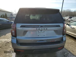 2023 Chevrolet Tahoe RST with VIN 1GNSKRKD4PR232976, listed as a Copart auction lot 87822015 with 58,484 mi miles and Salvage title. Bid and sale history available at DreamBid. Image 6.