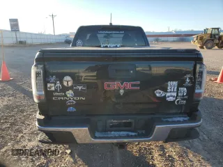 2015 GMC Canyon 4WD SLE with VIN 1GTH6BE37F1133213, listed as a Copart auction lot 82404014 with 142,149 mi miles and Salvage Title. Bid and sale history available at carsss.com. Image 6.