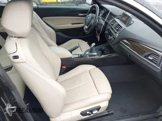 2016 BMW 2 Series 228i xDrive with VIN WBA1G9C50GV726365, listed as a IAAI auction lot 42358820 with 97,530 mi miles and . Bid and sale history available at DreamBid. Image 5.