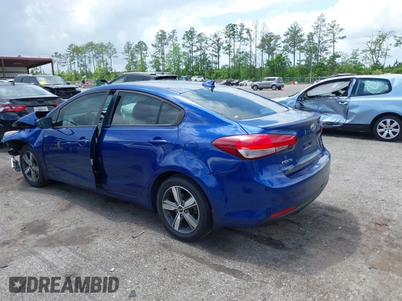 2018 Kia Forte LX with VIN 3KPFL4A77JE281839, listed as a IAAI auction lot 42012006 with 134,675 mi miles and . Bid and sale history available at DreamBid. Image 3.