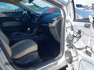 2016 Ford Edge SEL with VIN 2FMPK3J81GBC31668, listed as a IAAI auction lot 40769410 with 125,549 mi miles. Bid and sale history available at carsss.com. Image 5.