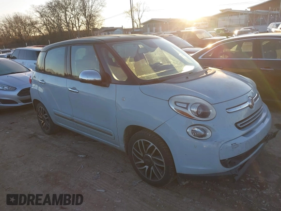 2015 FIAT 500L Lounge with VIN ZFBCFACH8FZ031314, listed as a IAAI auction lot 41392026 with 184,145 mi miles. Bid and sale history available at carsss.com. Image 1.