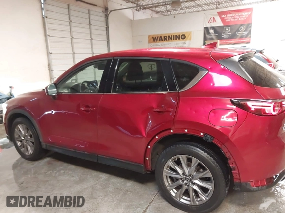 2020 Mazda CX-5 Grand Touring with VIN JM3KFBDM1L1809951, listed as a IAAI auction lot 41345854 with 117,376 mi miles. Bid and sale history available at carsss.com. Image 15.