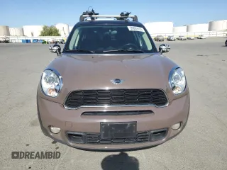 2013 MINI Countryman S ALL4 z VIN WMWZC5C51DWP30390, wystawiony jako Copart lot #59869105 z przebiegiem 111 843 mil mil oraz Szkoda całkowita • Salvage title. Historia ofert i sprzedaży dostępna na DreamBid. Obrazek 5.