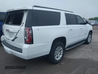 2019 GMC Yukon XL SLT z VIN 1GKS1GKC8KR395425, wystawiony jako IAAI lot #41910104 z przebiegiem 105 760 mil mil oraz . Historia ofert i sprzedaży dostępna na DreamBid. Obrazek 4.