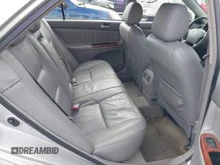 2006 Toyota Camry LE z VIN 4T1BF30K96U119883, wystawiony jako IAAI lot #41858665 z przebiegiem 228 340 mil mil oraz . Historia ofert i sprzedaży dostępna na DreamBid. Obrazek 8.