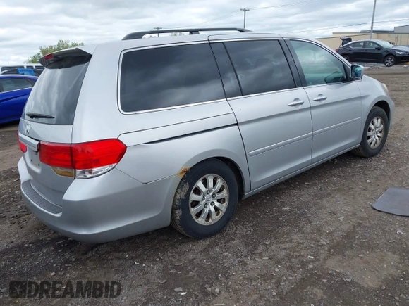 2010 Honda Odyssey EX z VIN 5FNRL3H44AB101312, wystawiony jako IAAI lot #42264744 z przebiegiem 173 917 mil mil oraz . Historia ofert i sprzedaży dostępna na DreamBid. Obrazek 4.