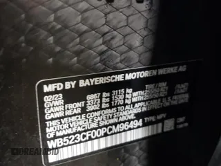 2023 BMW iX xDrive50 z VIN WB523CF00PCM96494, wystawiony jako Copart lot #48879714 z przebiegiem 6362 mil mil oraz . Historia ofert i sprzedaży dostępna na DreamBid. Obrazek 12.