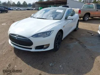 2014 Tesla Model S 60 kWh Battery with VIN 5YJSA1H15EFP50589, listed as a IAAI auction lot 41553114 with NaN miles. Bid and sale history available at carsss.com. Image 18.