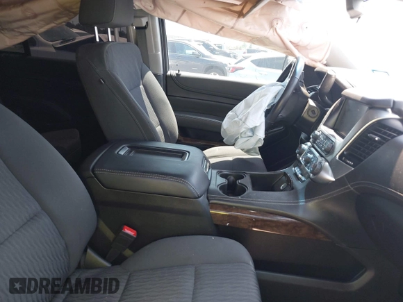 2020 Chevrolet Tahoe LS with VIN 1GNSCAKCXLR293278, listed as a IAAI auction lot 41973191 with 61,907 mi miles and . Bid and sale history available at DreamBid. Image 5.