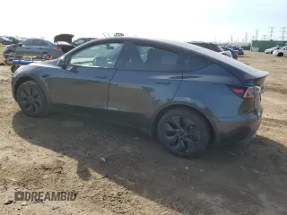 2024 Tesla Model Y with VIN 7SAYGDED7RF163537, listed as a Copart auction lot 48639255 with 7,193 mi miles and Salvage Title. Bid and sale history available at DreamBid. Image 2.