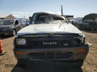 1991 Toyota Pickup DLX z VIN JT4VN13D4M5065504, wystawiony jako Copart lot #54058595 z przebiegiem 108 782 mil mil oraz Tytuł czysty. Historia ofert i sprzedaży dostępna na DreamBid. Obrazek 5.