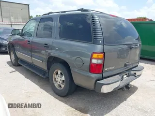 2002 Chevrolet Tahoe LS z VIN 1GNEC13ZX2R135330, wystawiony jako IAAI lot #42526127 z przebiegiem 277 208 mil mil oraz . Historia ofert i sprzedaży dostępna na DreamBid. Obrazek 3.