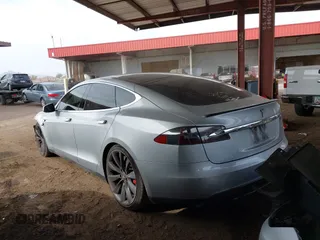 2014 Tesla Model S 60 with VIN 5YJSA1H17EFP35351, listed as a IAAI auction lot 41558434 with 151,002 mi miles and . Bid and sale history available at DreamBid. Image 3.