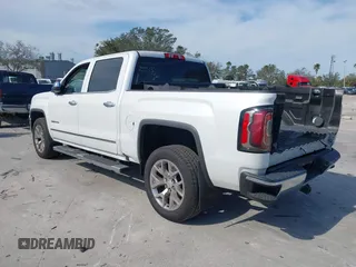 2017 GMC Sierra 1500 SLT with VIN 3GTP1NECXHG423591, listed as a IAAI auction lot 41509177 with 100,071 mi miles and . Bid and sale history available at DreamBid. Image 3.