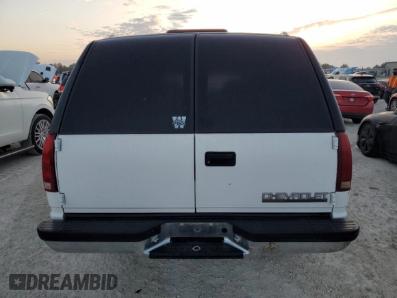 1999 Chevrolet Suburban with VIN 3GNEC16R3XG247177, listed as a Copart auction lot 75674564 with 132,546 mi miles and Non Repairable. Bid and sale history available at carsss.com. Image 6.